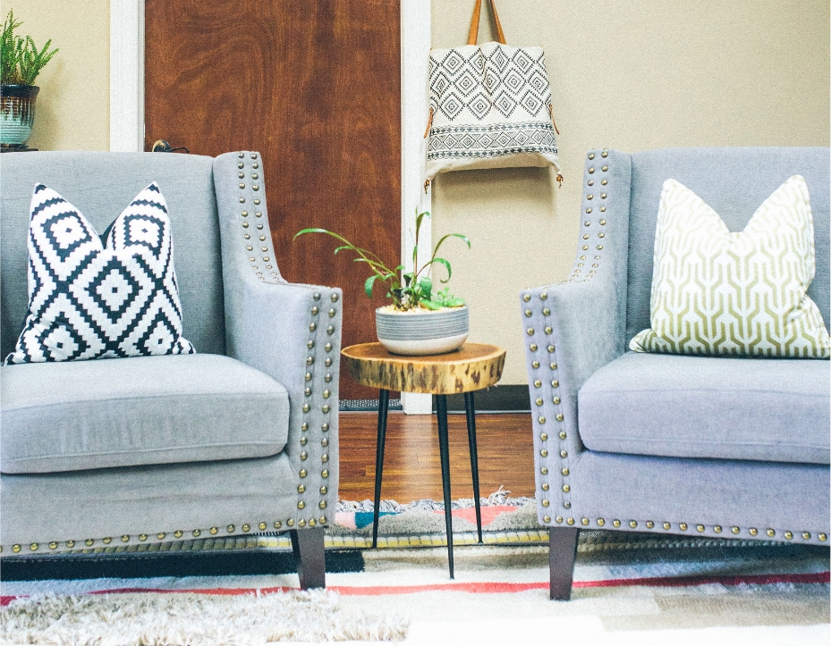 two comfy chairs in a room